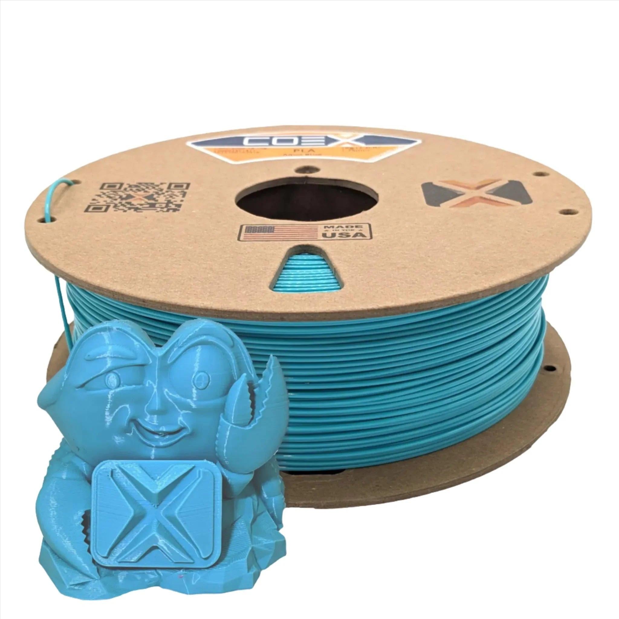 Aqua blue PLA 3D printer filament spool with a blue 3D printed figure in front.