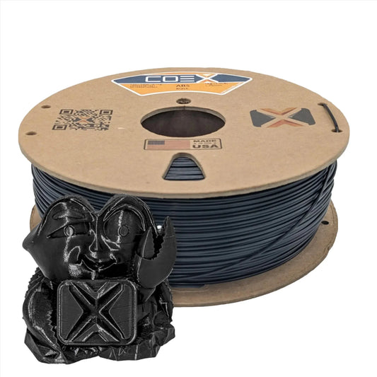 Black ABS 3D printer filament spool with small black figurine, COEX3D branding, made in USA