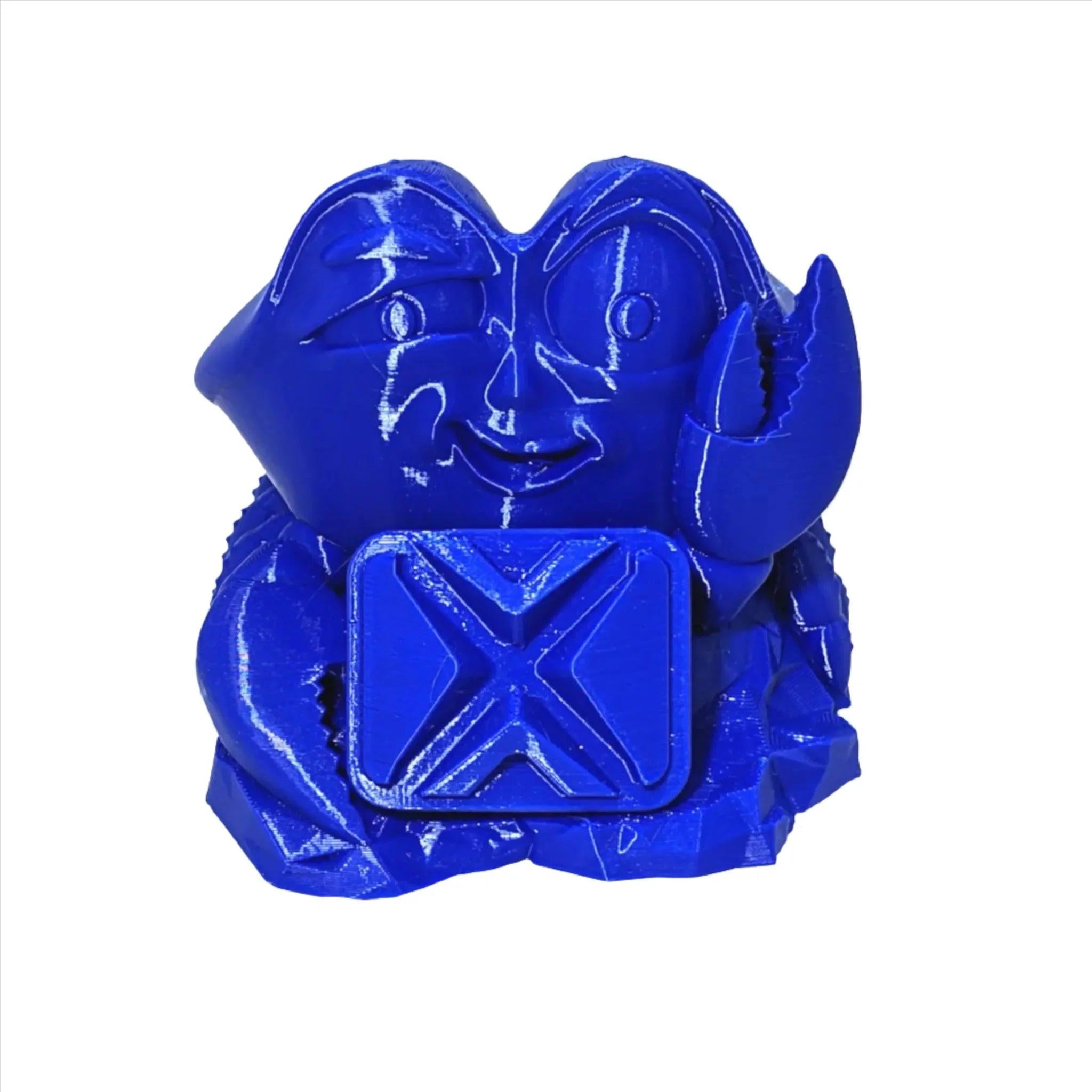 Cobalt blue 3D printed crab figurine with a cartoon face and box, made from PLA filament