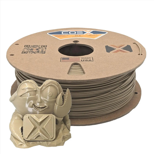 Desert tan PLA 3D printer filament spool with a tan crab figurine sample print.