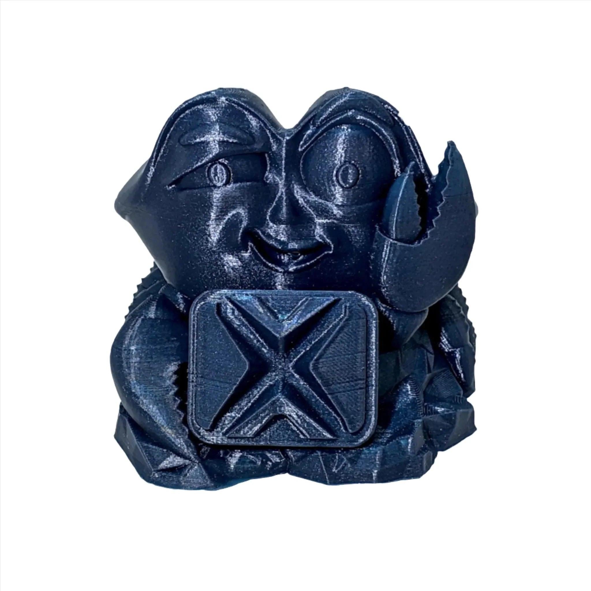 Shiny blue 3D printed cartoon crab figurine in PLA filament with box detail in front