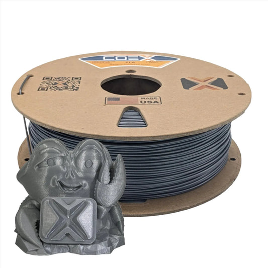 Metallic silver PLA 3D printer filament spool with a silver 3D printed crab figure