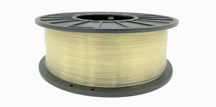 Natural ABS COEX 3D printer filament spool on a plain background