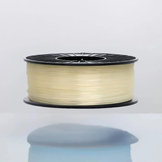 Natural CoexFlex 40D TPE 3D printer filament spool on reflective surface
