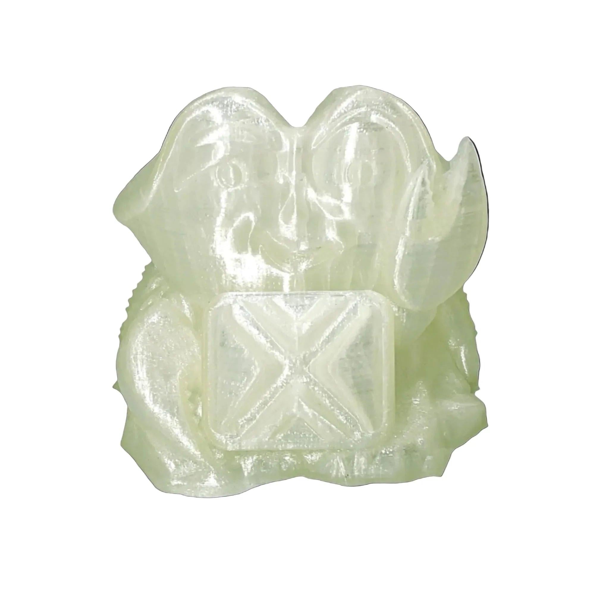 3D printed translucent figurine made with natural PLA Prime filament on white background