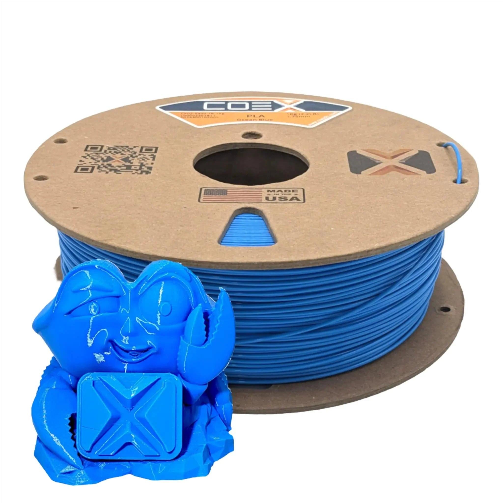 Ocean blue PLA 3D printer filament spool with blue 3D printed crab figure, coex3d brand