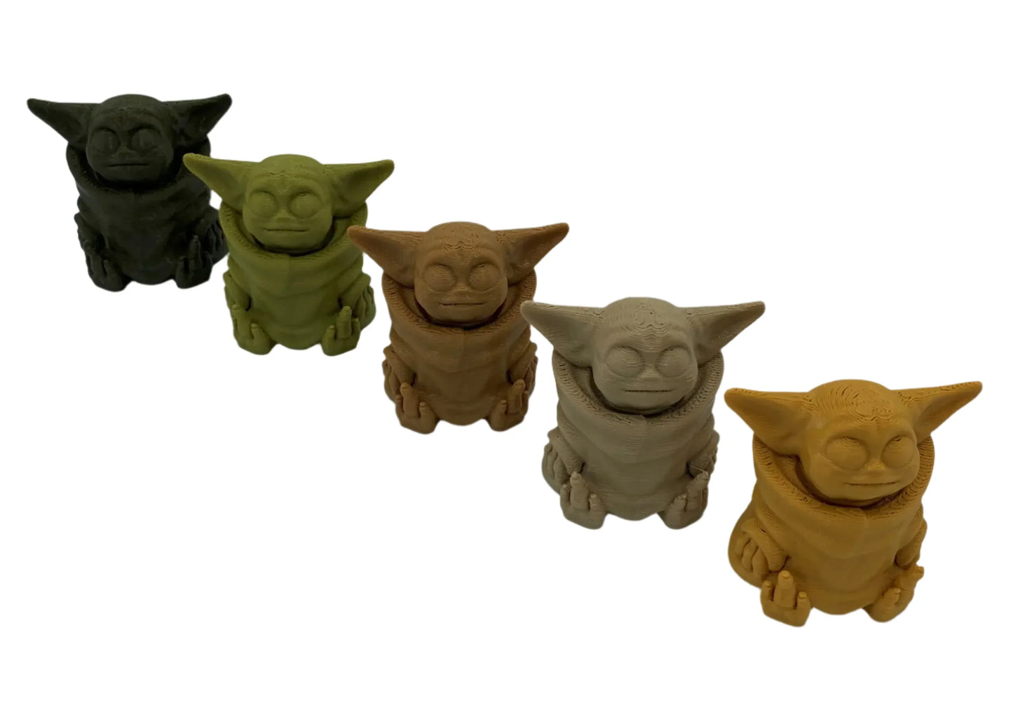 Five 3D printed Baby Yoda figurines in various PLA filament colors on a white background.