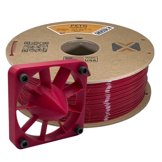 Raspberry PETG 3D printer filament spool with red 3D printed mechanical part