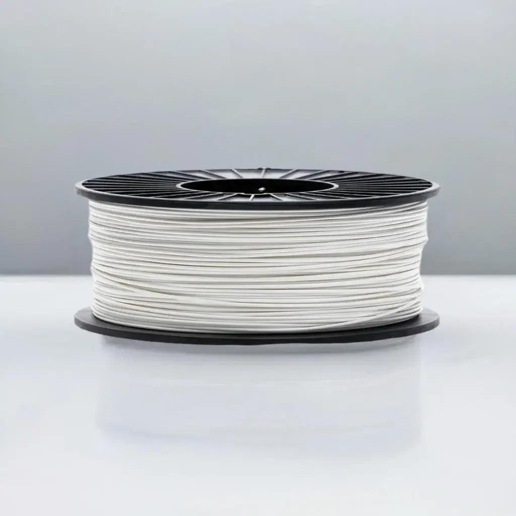 White 3D printer filament spool on black reel, CoexFlex 60A TPU, studio background