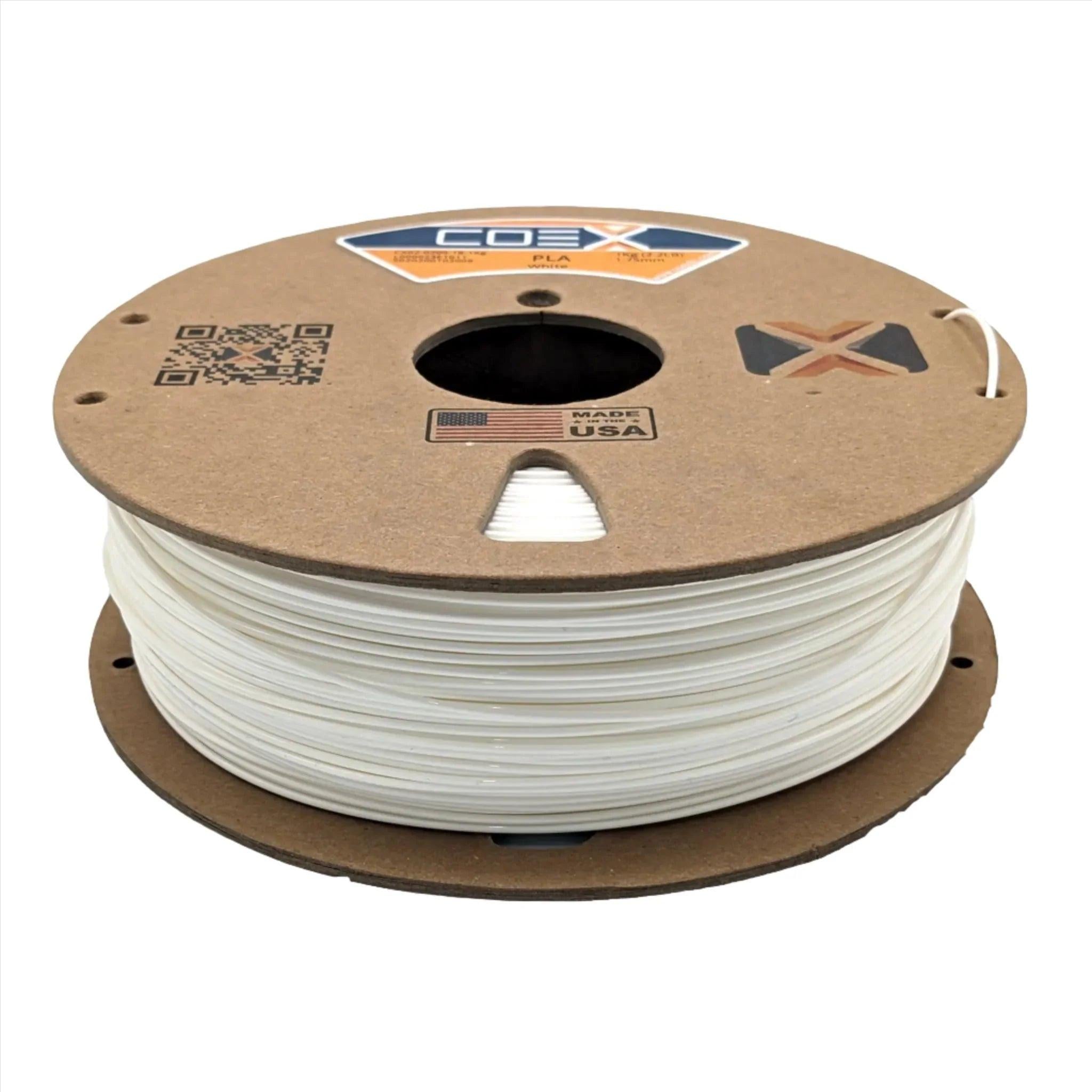 White PLA 3D printer filament spool by COEX, cardboard reel, Made in USA label visible