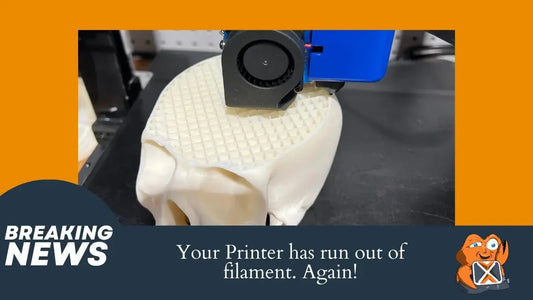 3D printer stops mid-print on a skull model due to filament runout, with breaking news banner.