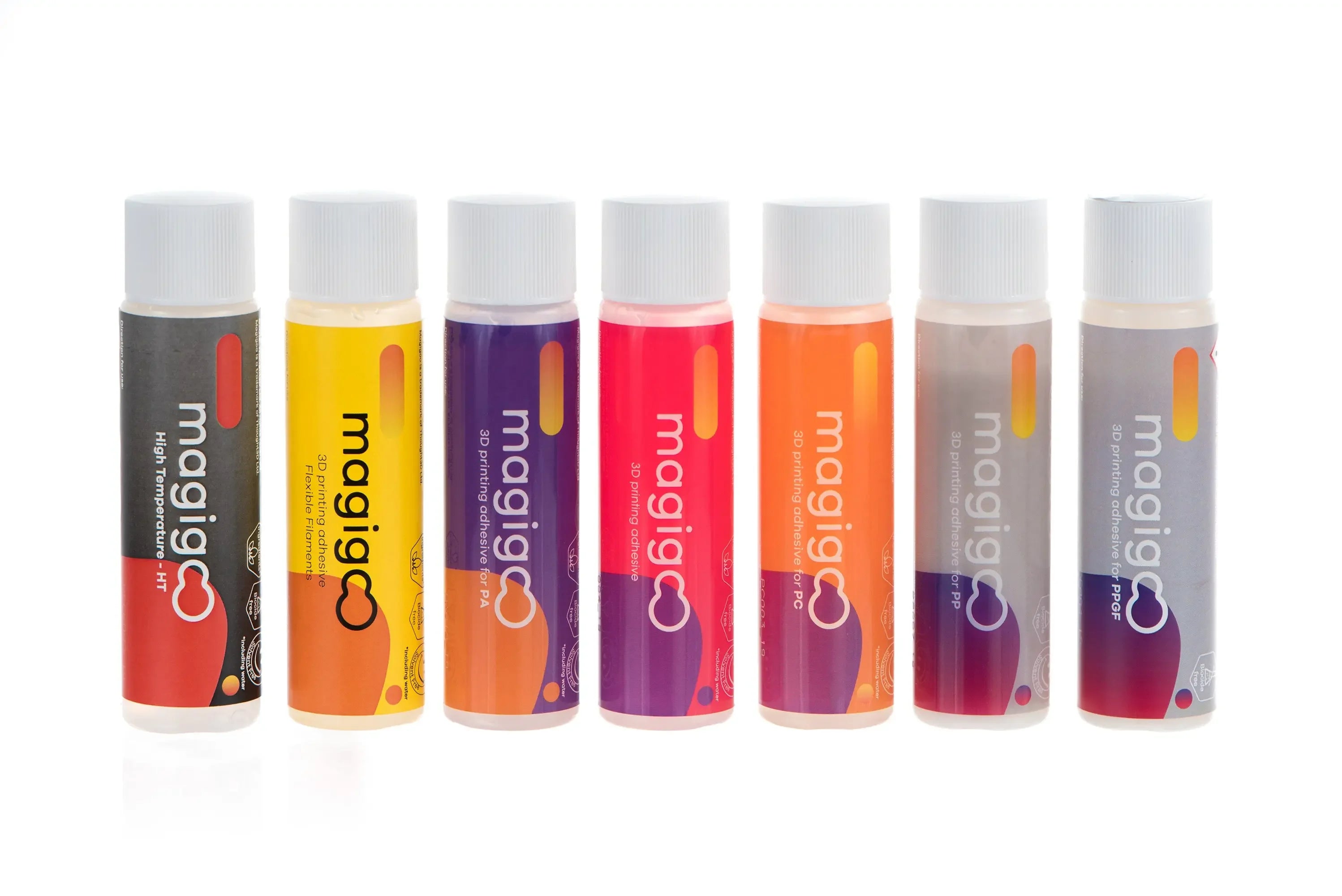 Magigoo 3D printing adhesive bottles in assorted colors, lined up on a white background