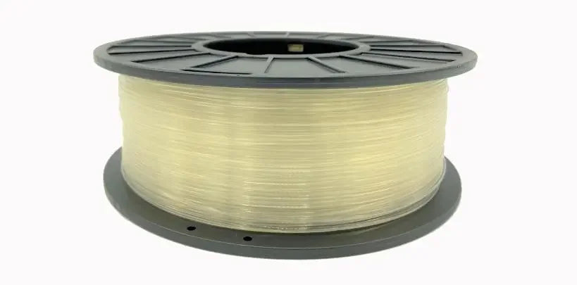 Natural ABS COEX 3D printer filament spool on a plain background