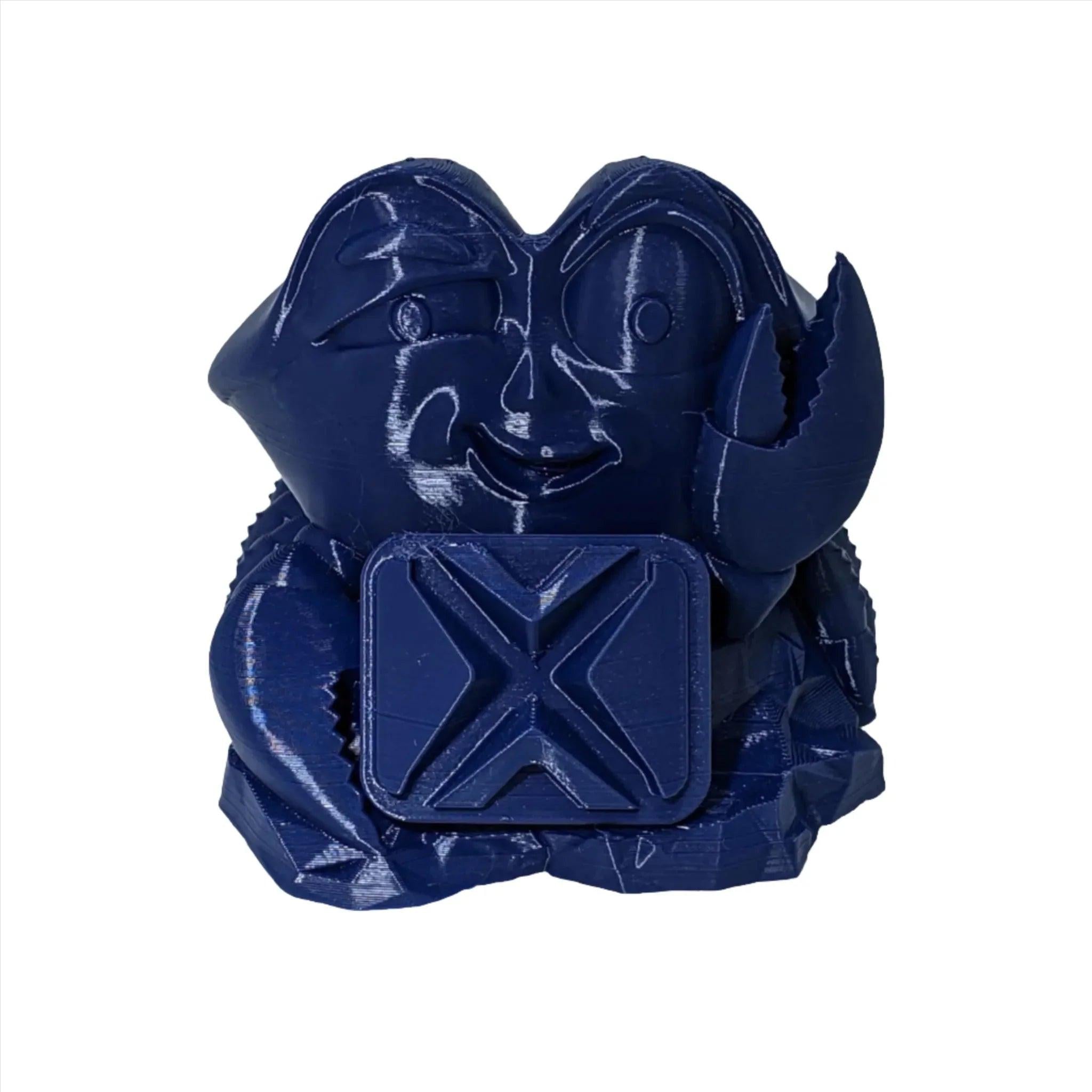 Navy blue 3D printed crab figurine made with PLA filament on a white background