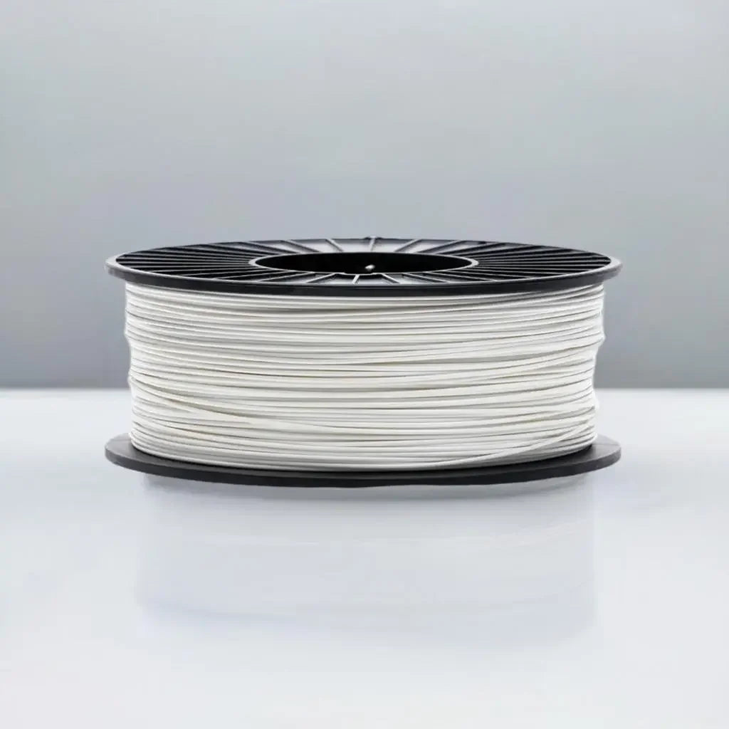 White 3D printer filament spool on black reel, CoexFlex 60A TPU, studio background