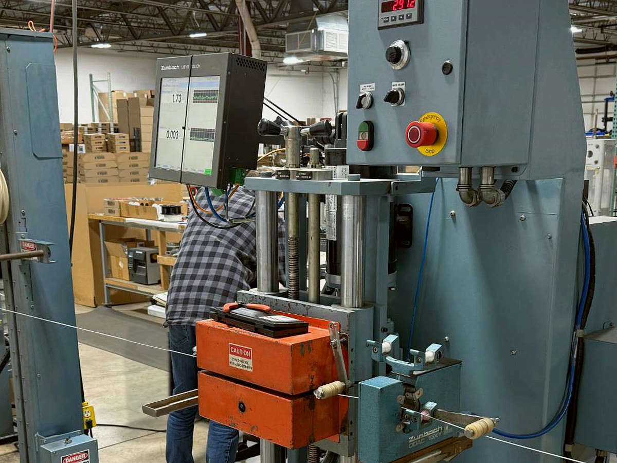 Laser micrometer measuring filament diameter on the COEX 3D line